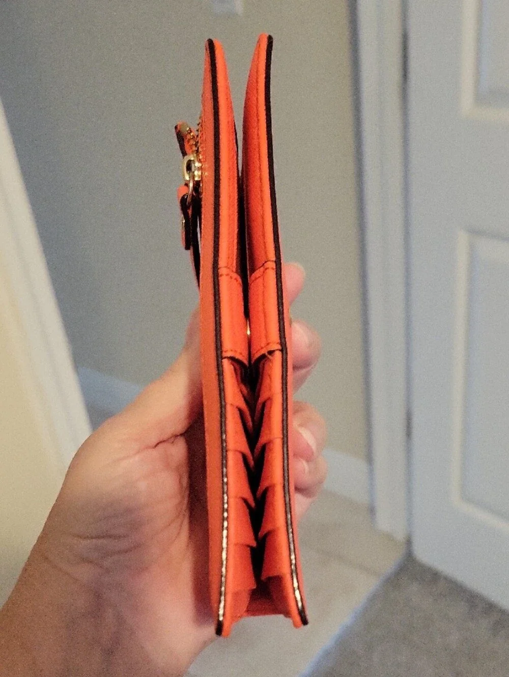 kate spade Bifold snap close orange wallet side zip pouch